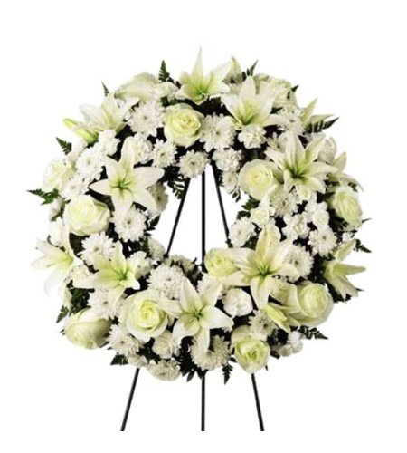 Round Shaped Lily And Rose Funeral Arrangement
