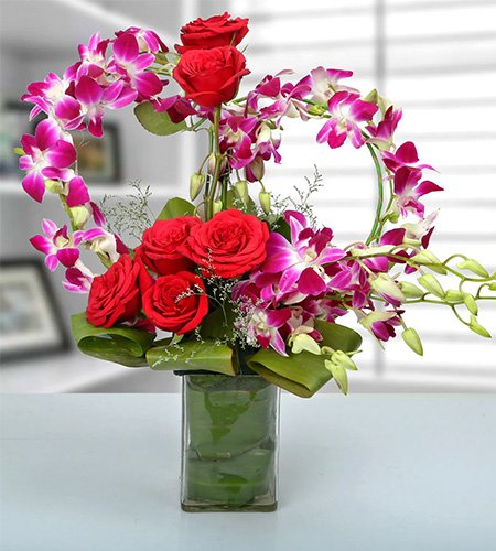 Rose And Orchid Arrangement