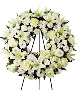 Round Shaped Lily And Rose Funeral Arrangemen...